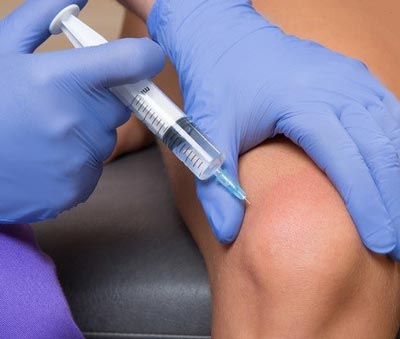 Ozone therapy and joint injection